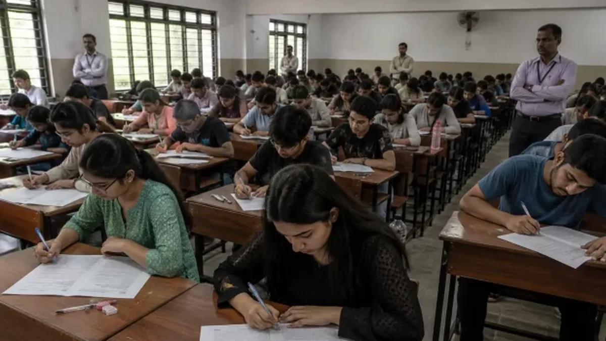 Students writing an entrance exam in an exam hall in India
