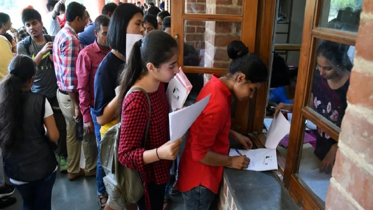 Students standing outside a university building during admission season in India