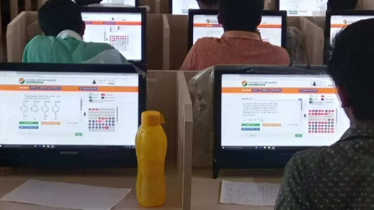 Students taking the CUET UG exam in a computer-based test centre in India