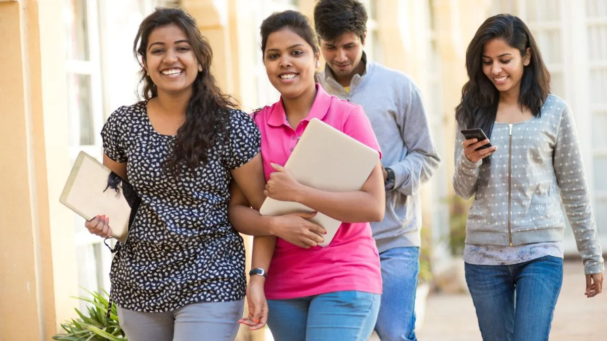 Indian college students walking on a university campus in India