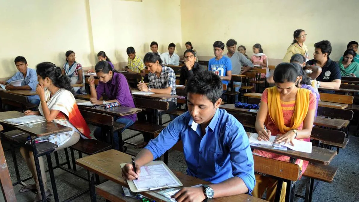 Students writing an exam in a hall in India ahead of the IBPS SO Mains 2026