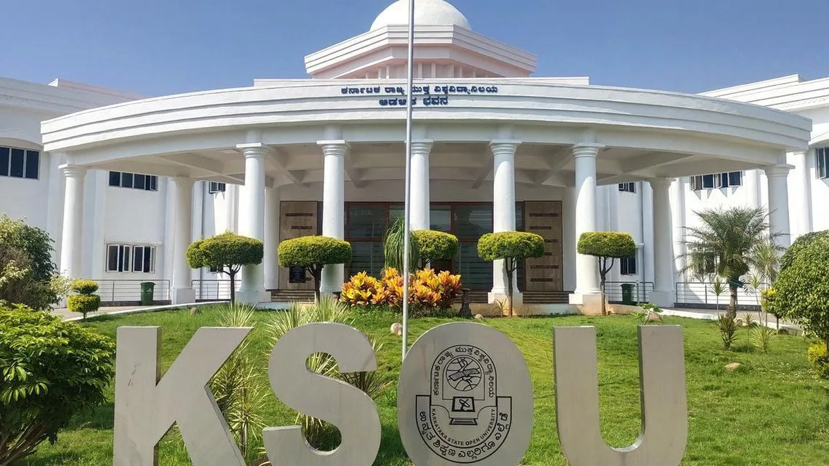 The Karnataka State Open University campus building in Mysuru with the KSOU sign in front