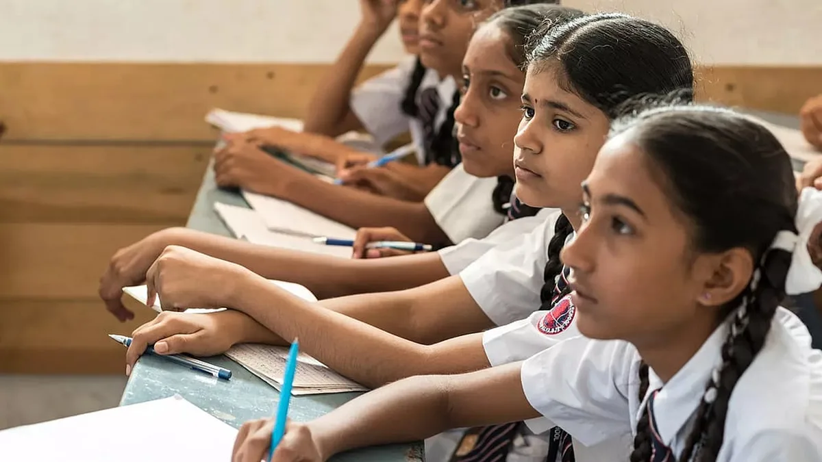 Indian school students sitting in a classroom during a lesson