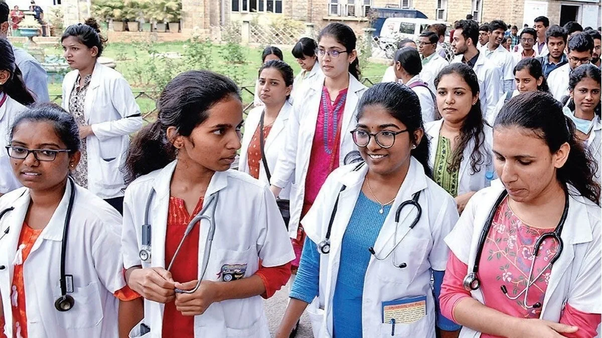 Indian medical students in white coats outside a college building after NEET UG counselling