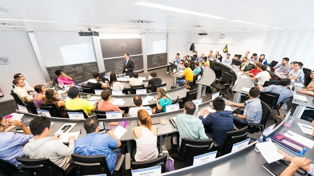 MBA students in a business school classroom during a lecture