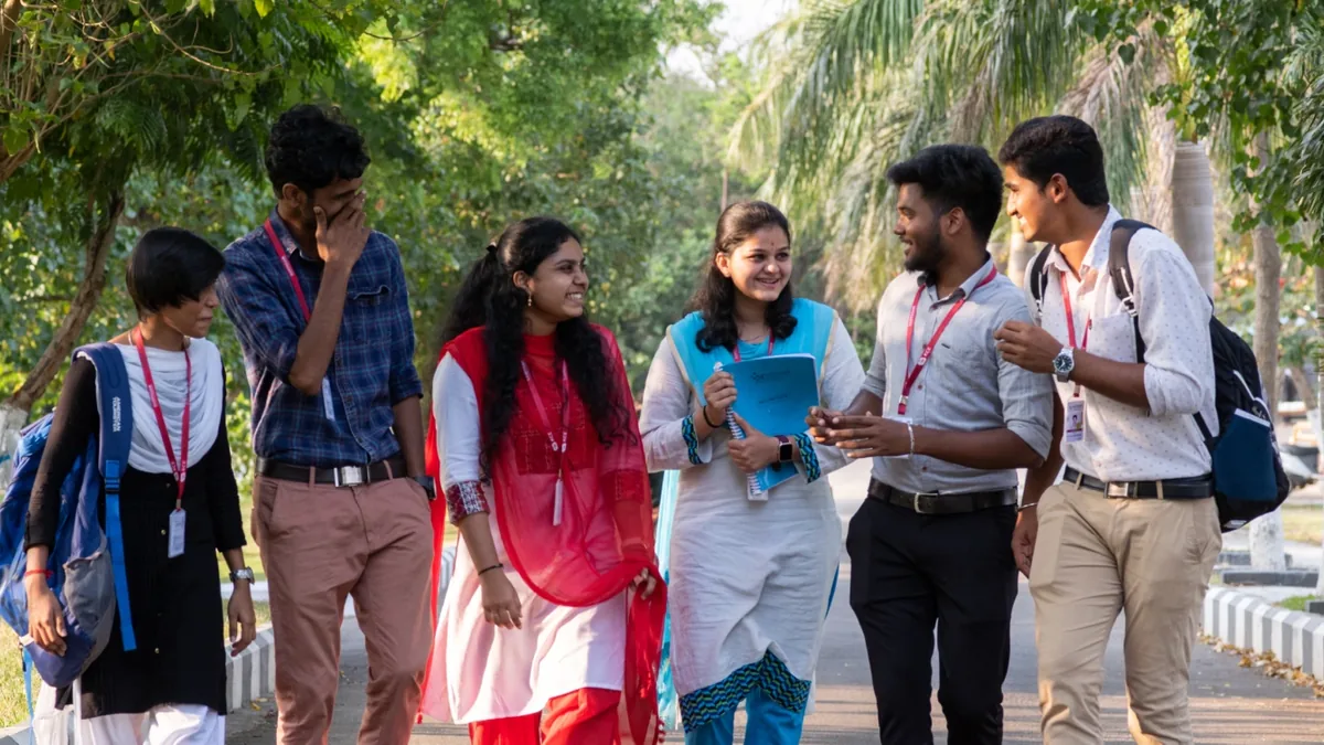 College students walking on a campus road in India