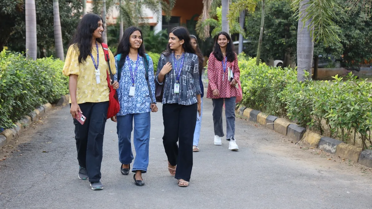 Indian college students walking on their campus