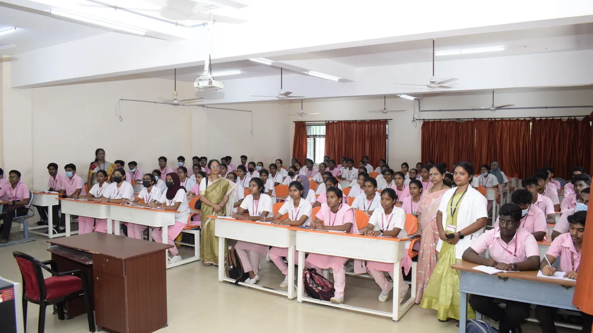 Indian medical and nursing students sitting in a college classroom