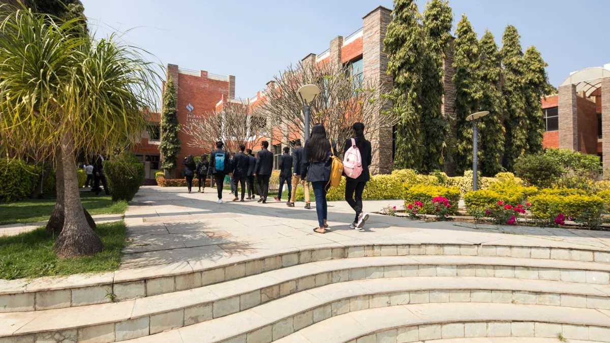 Students walking across a university campus in India during the admission season